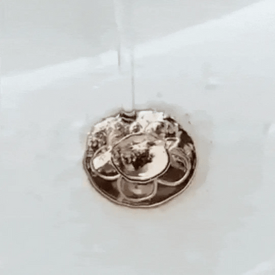 AquaStop ~ Universal Pop-up Drain Stopper Prevents Hair Clogs in Bath & Shower